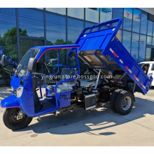 Three wheeled dump truck